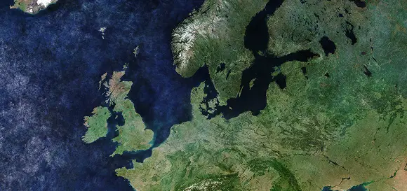 Clear satellite photo of the United Kingdom and Ireland next to continental Europe, including France, Belgium, and the North Sea.